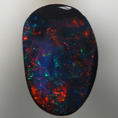 SOLID BLACK OPAL Very sparkly cherry red and green